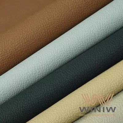 1.2mm PU otomobil sentetik kwi chèz twal zoranj nwa koulè mawon