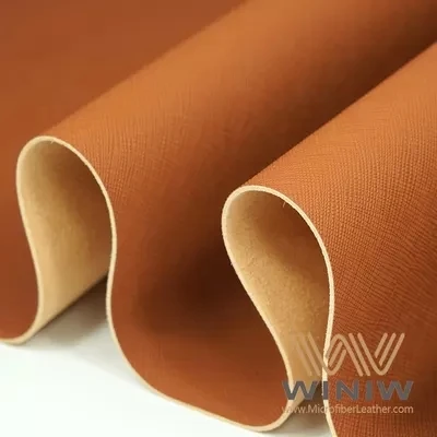 Nonwoven mikrofibr atifisyèl kwi materyèl dekoratif pou sak bagaj senti